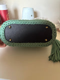 Handmade crocheted tote bag with tassel